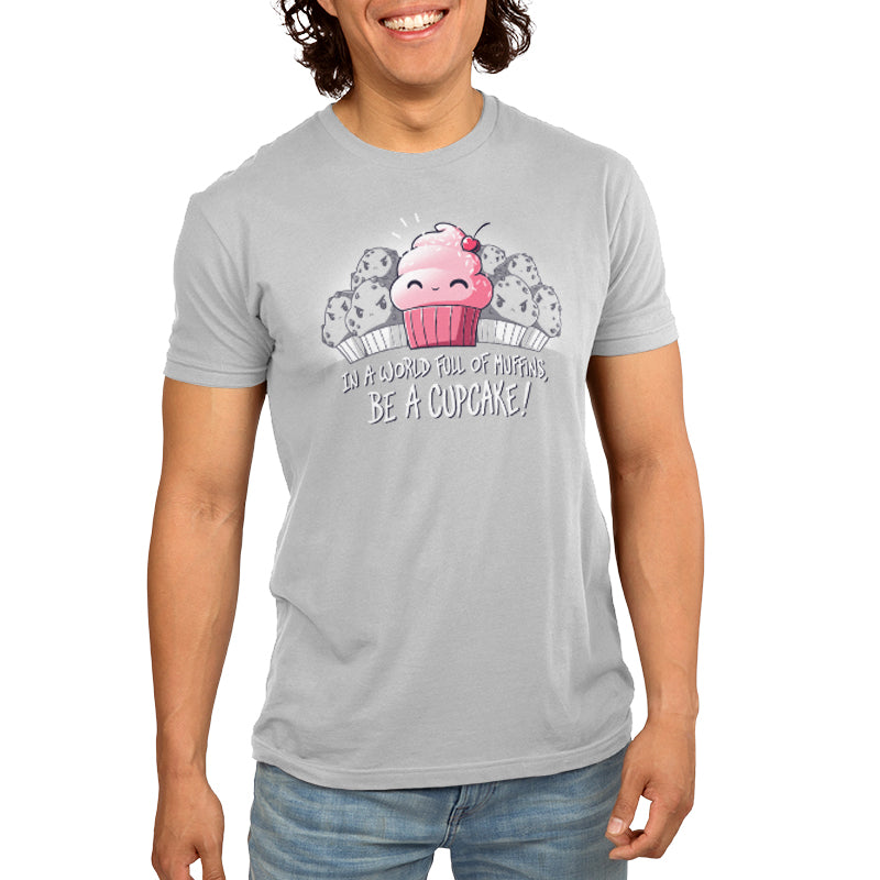 A man in a silver TeeTurtle t-shirt with a Be a Cupcake design.