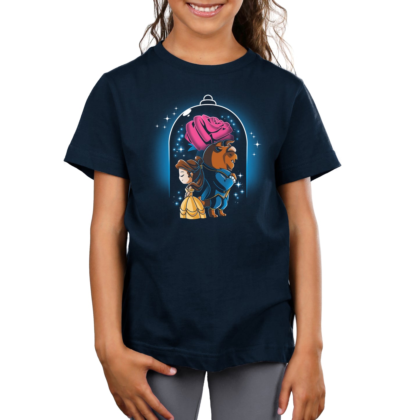 A girl wearing an officially licensed Disney Beauty and The Beast t-shirt.
