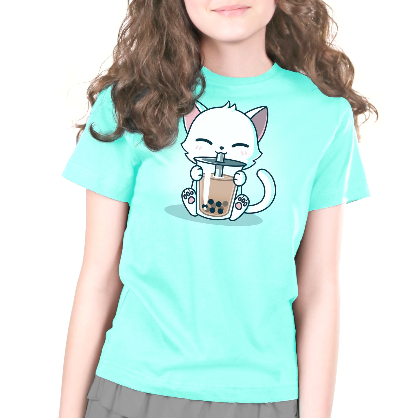 A girl wearing a "Boba Cat" t-shirt by TeeTurtle with a cartoon cat holding a cup of boba.