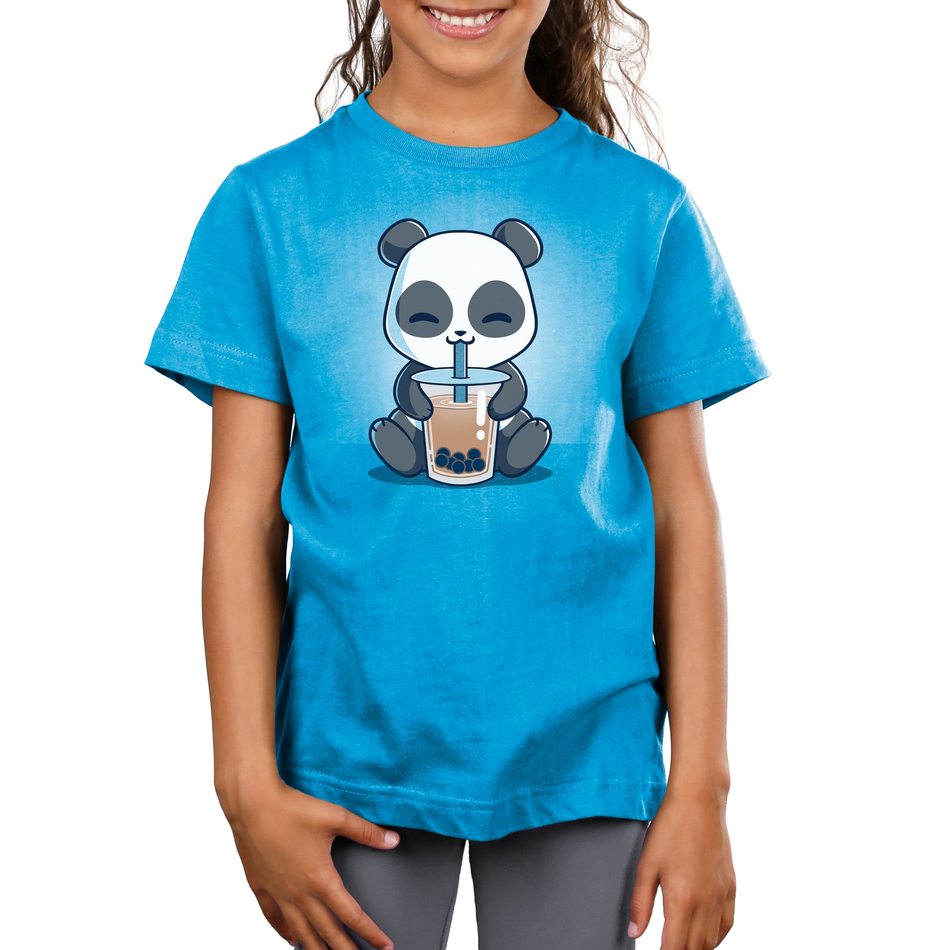 A girl wearing a TeeTurtle Boba Panda t-shirt.