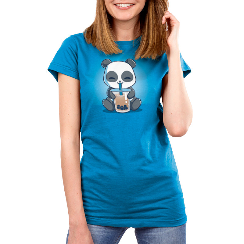 A woman wearing a blue TeeTurtle T-shirt with a Boba Panda on it.