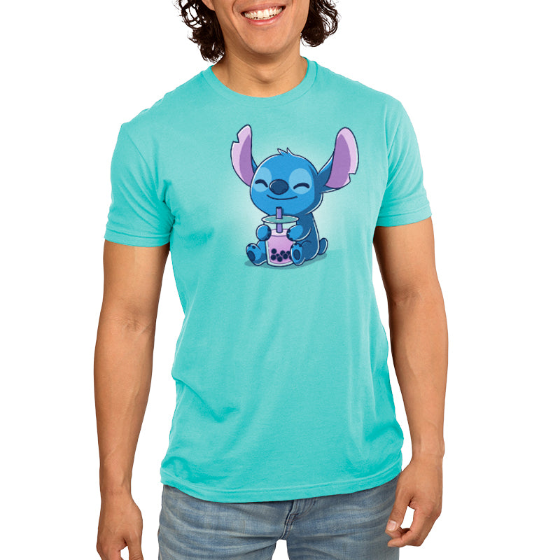 A young man wearing a Disney Boba Stitch T-shirt.