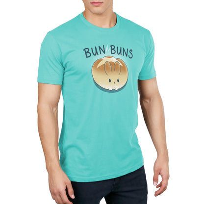 A man wearing a Caribbean Blue TeeTurtle Bun Buns T-shirt made of Ringspun Cotton.