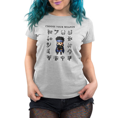 An officially licensed Monster Hunter T-shirt featuring a woman wearing the Choose Your Weapon shirt.