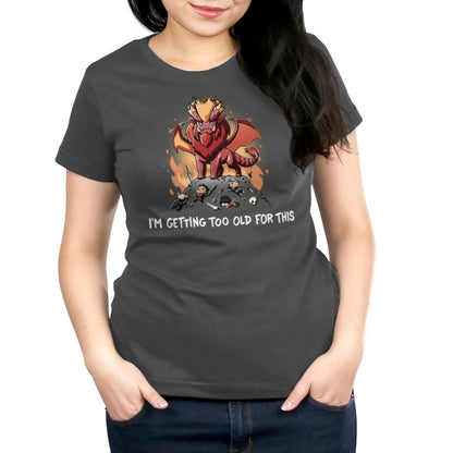 Premium Cotton T-shirt_TeeTurtle charcoal gray I'm Getting Too Old For This apparel featuring the elder dragon Teostra from Monster Hunter looming over fallen hunters and their equipment, with the caption, "I'm Getting Too Old For This".