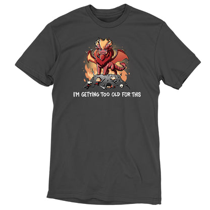 Premium Cotton T-shirt_TeeTurtle charcoal gray I'm Getting Too Old For This apparel featuring the elder dragon Teostra from Monster Hunter looming over fallen hunters and their equipment, with the caption, "I'm Getting Too Old For This".