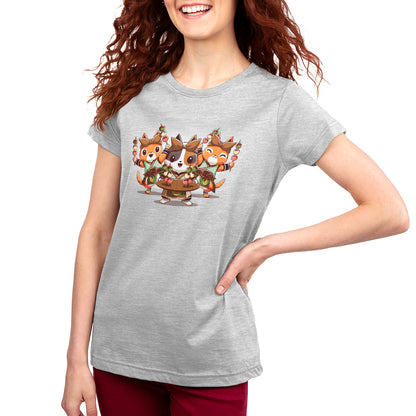 A Monster Hunter-themed women's t-shirt featuring an image of a woman holding a Village Chef Felynes teddy bear.