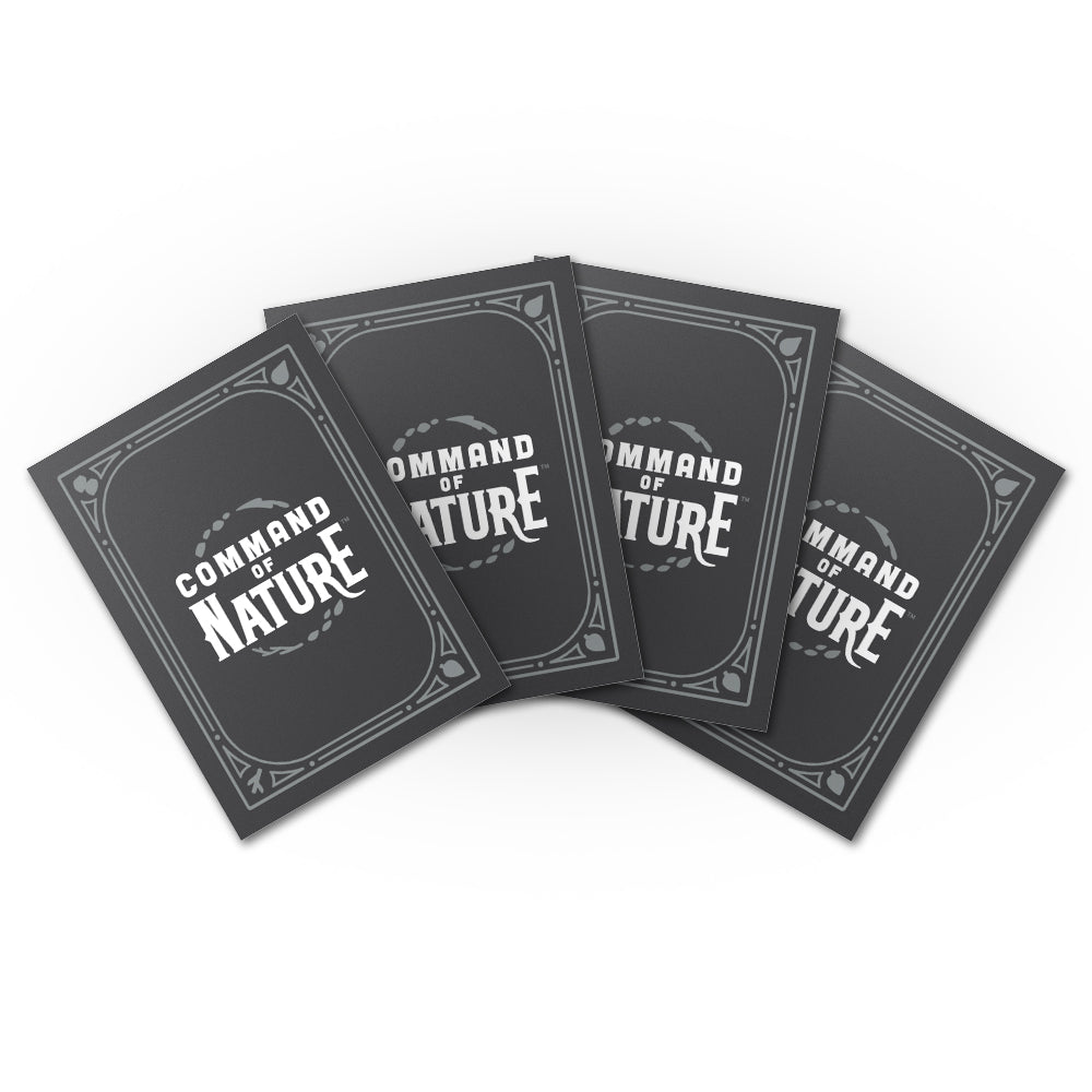 Four black cards with the text "COMMAND OF NATURE" are arranged in a fanned-out manner on a white background, perfectly showcasing what could be ideally protected by Unstable Games' Command of Nature: Card Sleeves for gamers.
