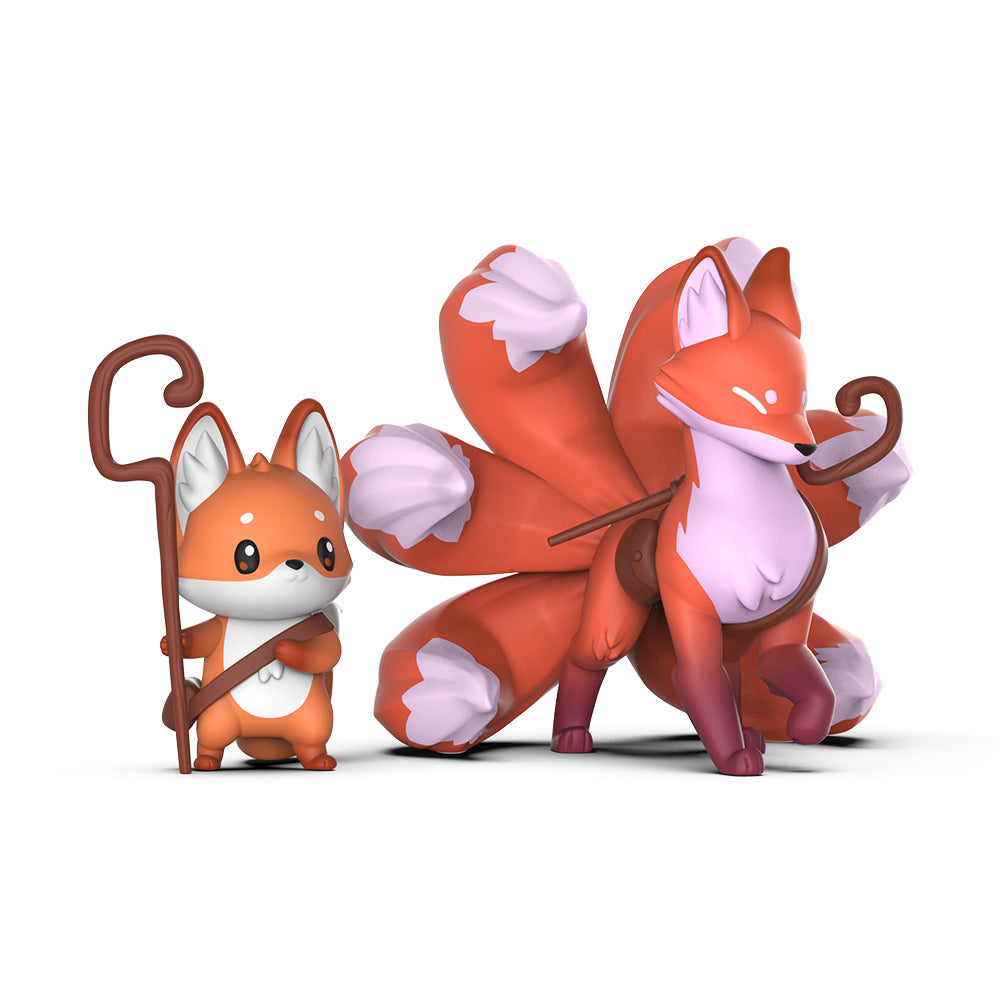 Two Casting Shadows: Kit Gale & Kit the Turbulent vinyl figures of cartoon foxes, one small with a walking stick and the other larger with an elaborate tail, standing on a white background by Unstable Games.