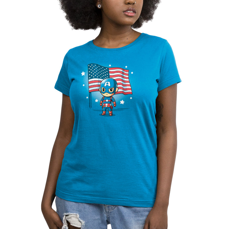A women's blue t-shirt with an American flag, officially licensed and featuring Captain America by Marvel.