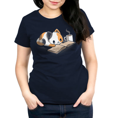 Premium Cotton T-shirt_TeeTurtle navy blue Coffee and a Good Book featuring a calico cat laying next to a hot cup of coffee as it reads a book.