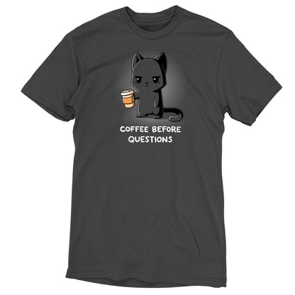 A charcoal gray Coffee Before Questions t-shirt with a cat holding a cup of coffee from TeeTurtle.