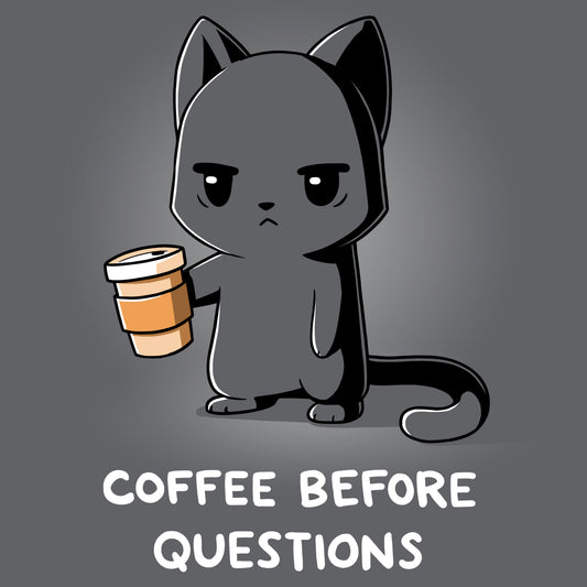 A charcoal gray cat holding a cup of TeeTurtle's Coffee Before Questions.