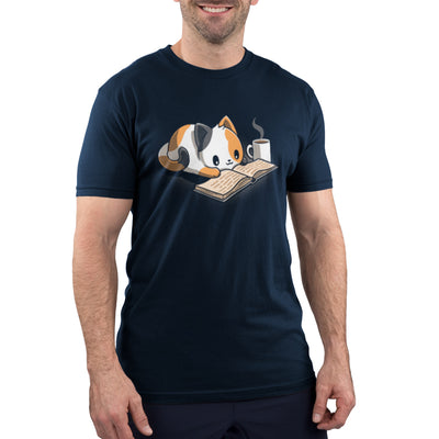 Premium Cotton T-shirt_TeeTurtle navy blue Coffee and a Good Book featuring a calico cat laying next to a hot cup of coffee as it reads a book.