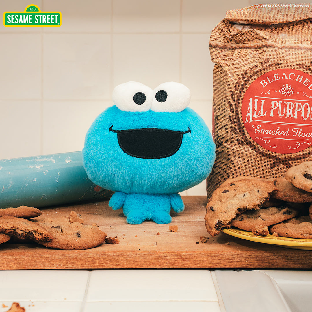 Cloudheads: 5" Cookie Monster sitting on a kitchen counter with cookies and a rolling pin