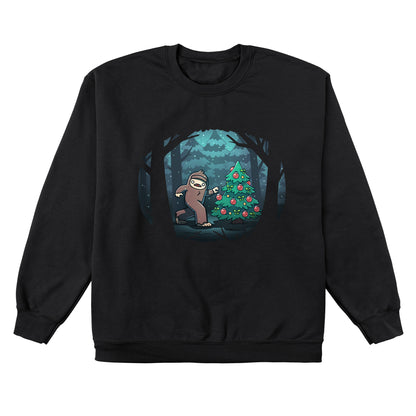 Crew Neck Sweatshirt_TeeTurtle black Bigfoot Christmas apparel featuring a sasquatch caught putting holiday decor on a tree in the middle of a snowy forest.