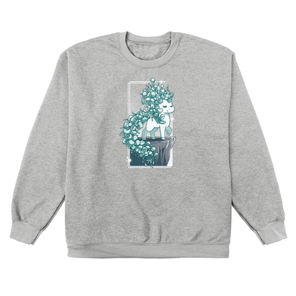 Crew Neck Sweatshirt_TeeTurtle heather gray Botanicorn apparel featuring a magical unicorn with a mane and tail made out of the plant silver falls, or silver nickel vine, standing elegantly with a hoof raised on a cliff.