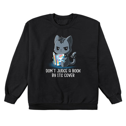 Crew Neck Sweatshirt_TeeTurtle Don't Judge a Book By It's Cover black design featuring seemingly grumpy, goth-looking cat wearing a spiked collar and spiked ring on its tail reading a bright, happy-looking rainbow-covered book above the text 'Don't Judge A Book By Its Cover.'