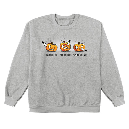 Crew Neck Sweatshirt_TeeTurtle Hear No Evil, See No Evil, Speak No Evil sport gray t-shirt featuring three pumpkins with knives in each. One is getting its ears carved, the second is getting its eyes carved, and the third is getting its mouth carved.