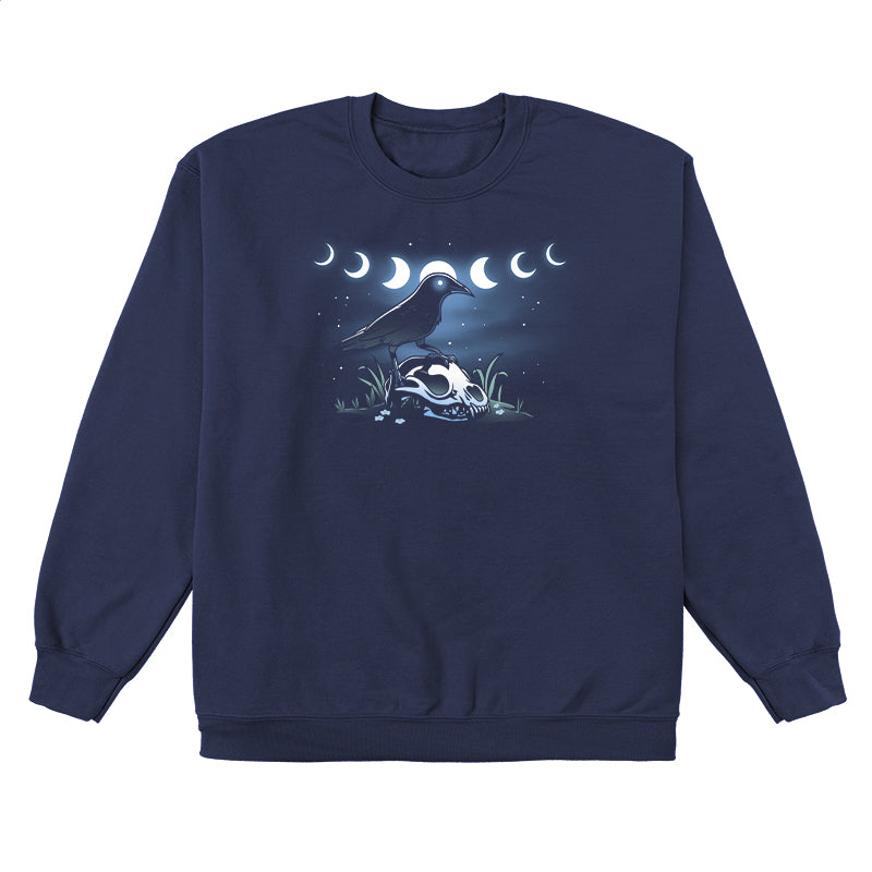 Crew Neck Sweatshirt_TeeTurtle Mystical Crow navy blue design featuring a crow with glowing eyes standing on an animal skull in a grassy area under a night sky.