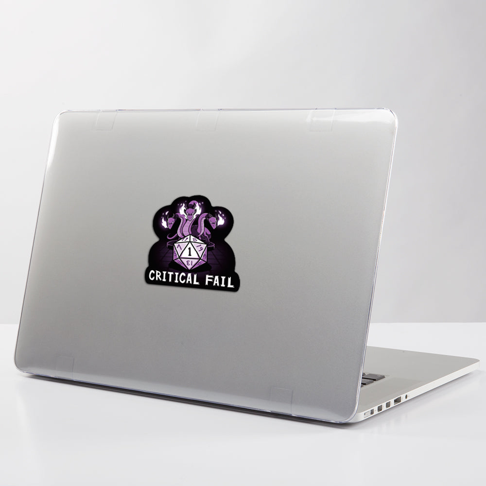 A laptop with a TeeTurtle Critical Fail Sticker on it featuring cute stickers.