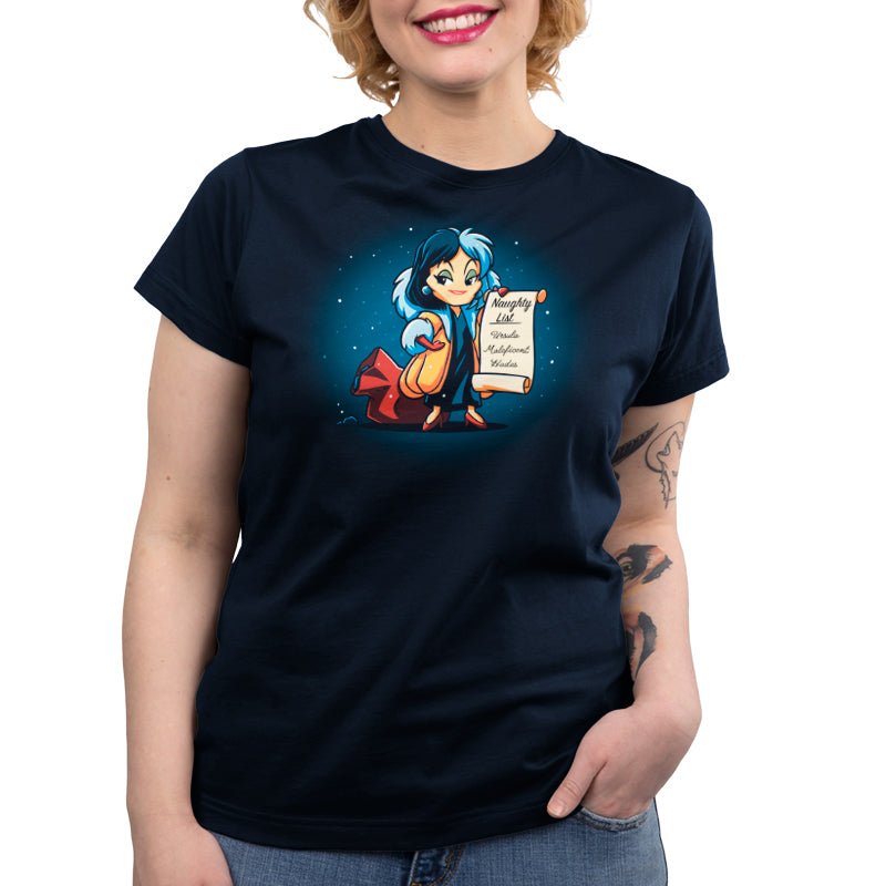 An officially licensed women's Disney t-shirt featuring an image of Cruella's Naughty List holding a book.