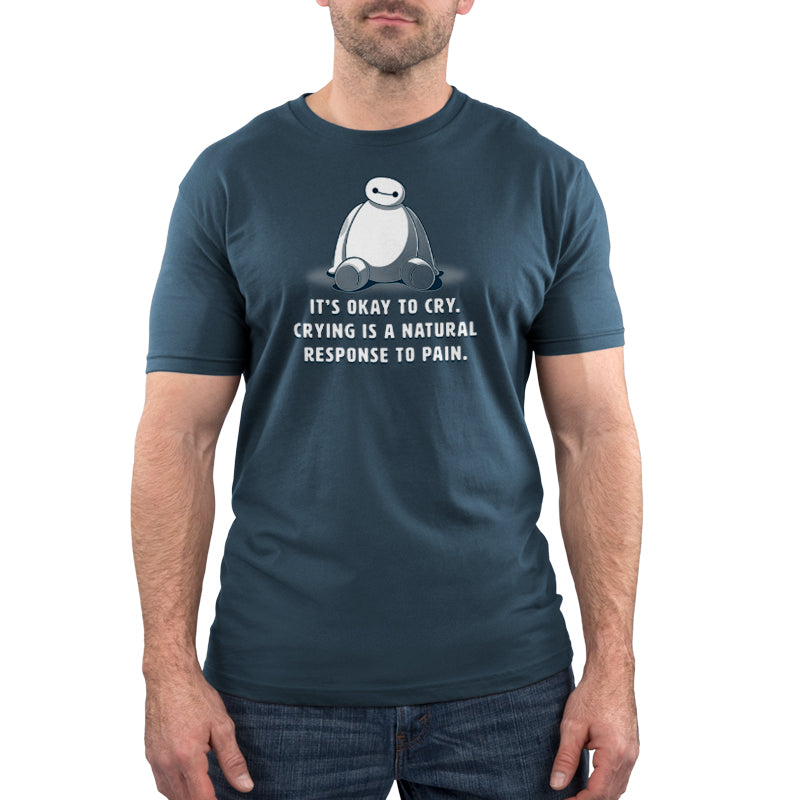 A penguin wearing an It's Okay To Cry Disney t-shirt.