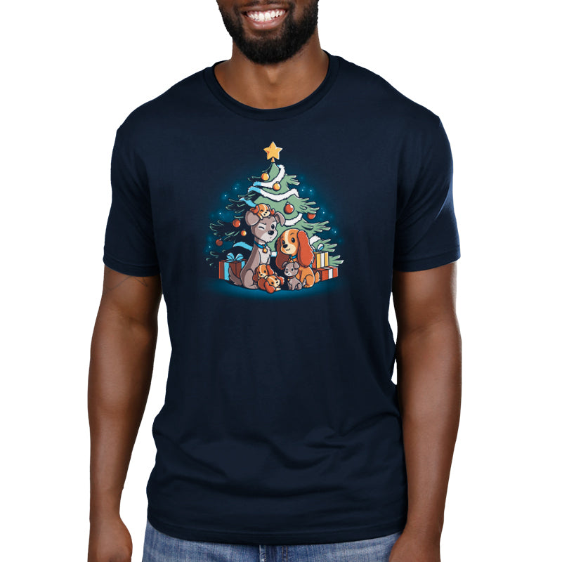 A man wearing a navy blue Disney T-shirt that says "Merry Christmas From Lady and the Tramp".