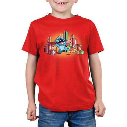 A young boy wearing a red Presents for Stitch t-shirt.