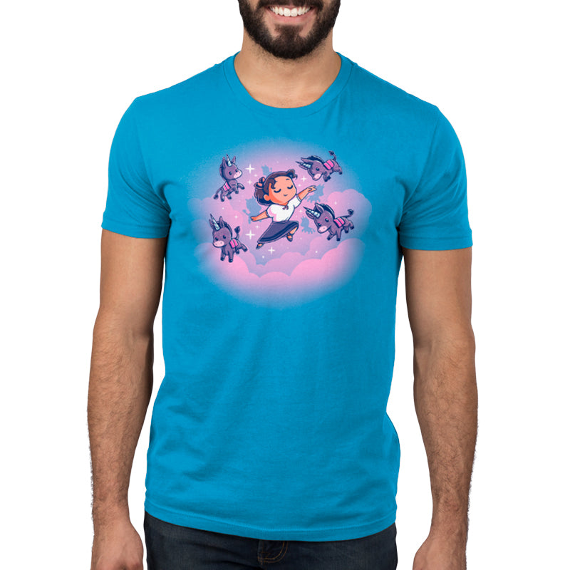 A man wearing a Disney cobalt blue t-shirt, Luisa's Dream.