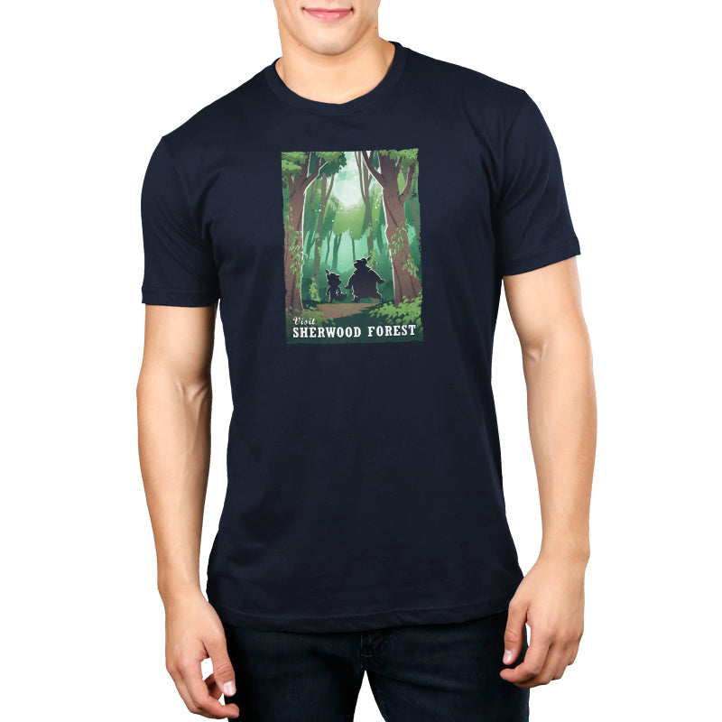 A man wearing an officially licensed Disney navy t-shirt with a picture of the Sherwood Forest Travel Poster.