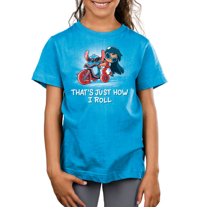 A girl wearing a Cobalt Blue t-shirt featuring a licensed Lilo and Stitch print of the product "That’s Just How I Roll (Lilo and Stitch)" by the brand Disney