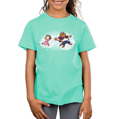 A girl wearing an officially licensed Disney T-shirt with two Snow Angels (Belle and Beast) cartoon characters on it.