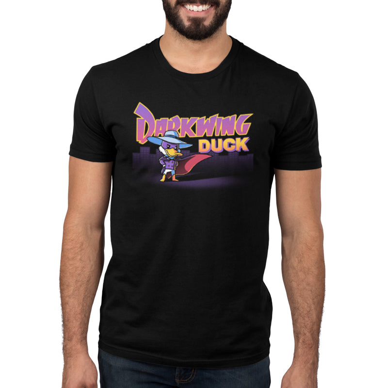 A man wearing a Disney officially licensed "Darkwing Duck" black t-shirt.