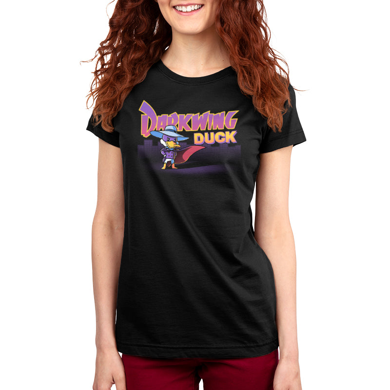 A woman wearing a T-shirt that says "Disney's Darkwing Duck".