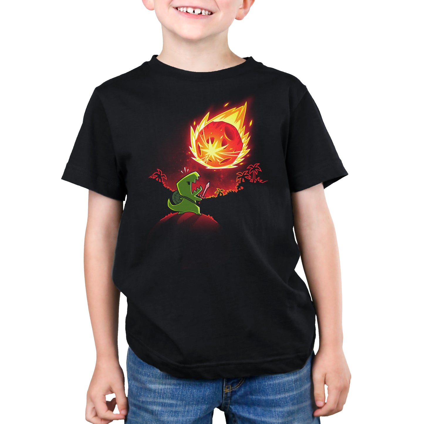 A young boy wearing a TeeTurtle Meteor Destroyer black t-shirt with a flaming frog on it.
