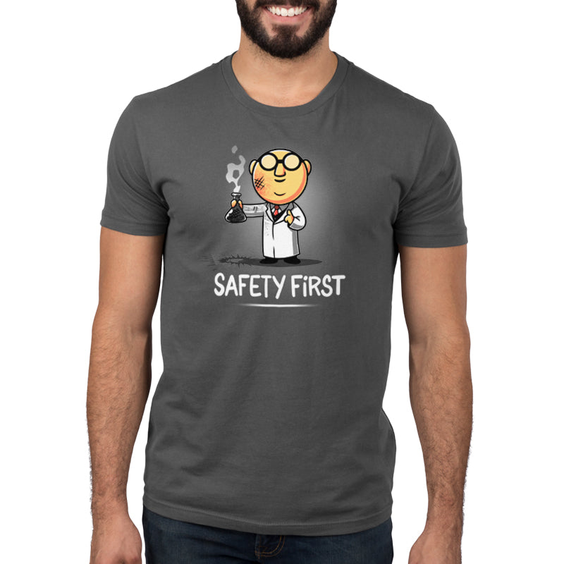 A man wearing a Muppets: Dr. Bunsen Honeydew: Safety First T-shirt.