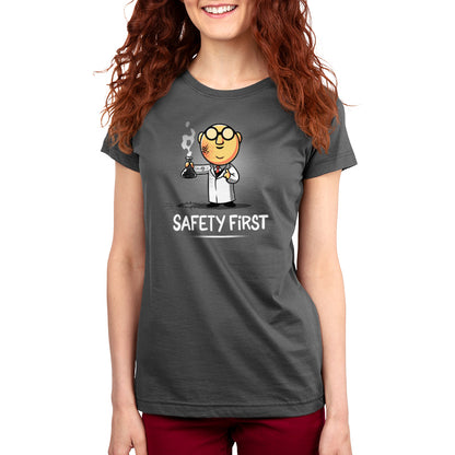A woman wearing a T-shirt that says Dr. Bunsen Honeydew: Safety First, made by Muppets.