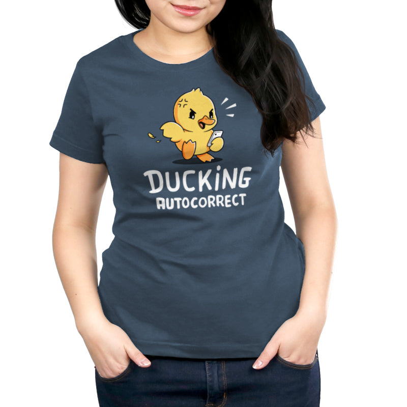 A woman wearing a TeeTurtle T-shirt with the Ducking Autocorrect quote.