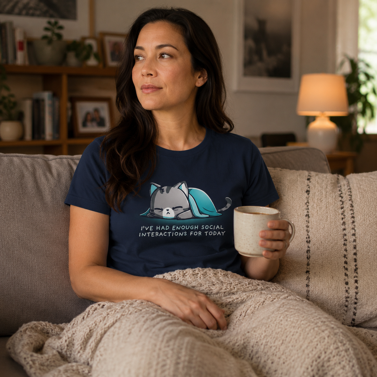 Women's Premium T-Shirt_TeeTurtle navy Enough Social Interactions Women's Premium T-Shirt featuring an exhausted gray tabby cat lying under a teal blanket with the text "I've Had Enough Social Interactions For Today."