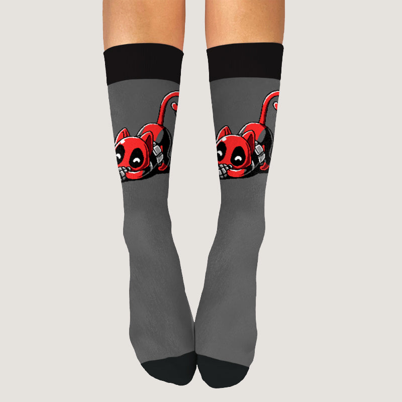 A woman wearing Marvel Catpool socks.