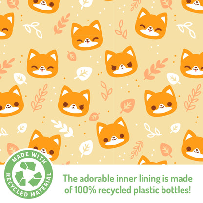 Patterned fabric featuring TeeTurtle's Plushiverse Feeling Foxy plushie fanny pack cartoon fox faces with leaves and the text indicating the lining is made of 100% recycled plastic bottles.