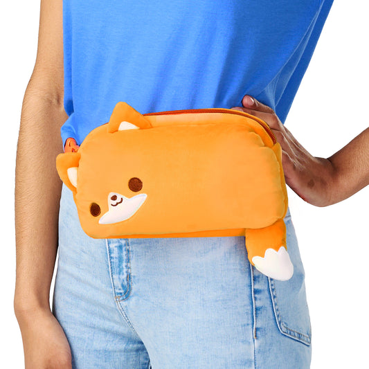 A person carrying a TeeTurtle Plushiverse Feeling Foxy Plushie Fanny Pack with an adjustable belt.