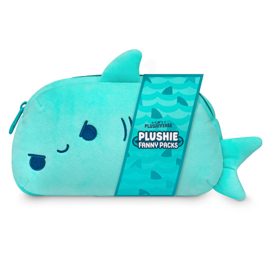A teal Plushiverse Jaw-Some Shark plushie fanny pack with an adjustable belt, a zipper, and a label reading 