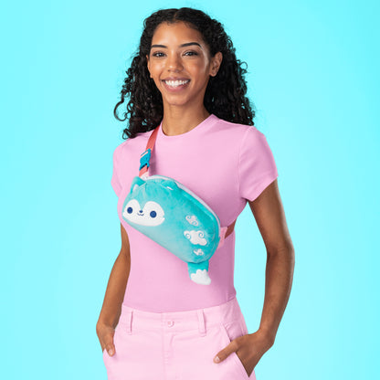 A woman wearing pink pants and a Plushiverse Fair Weather Wolf Plushie Fanny Pack by TeeTurtle.