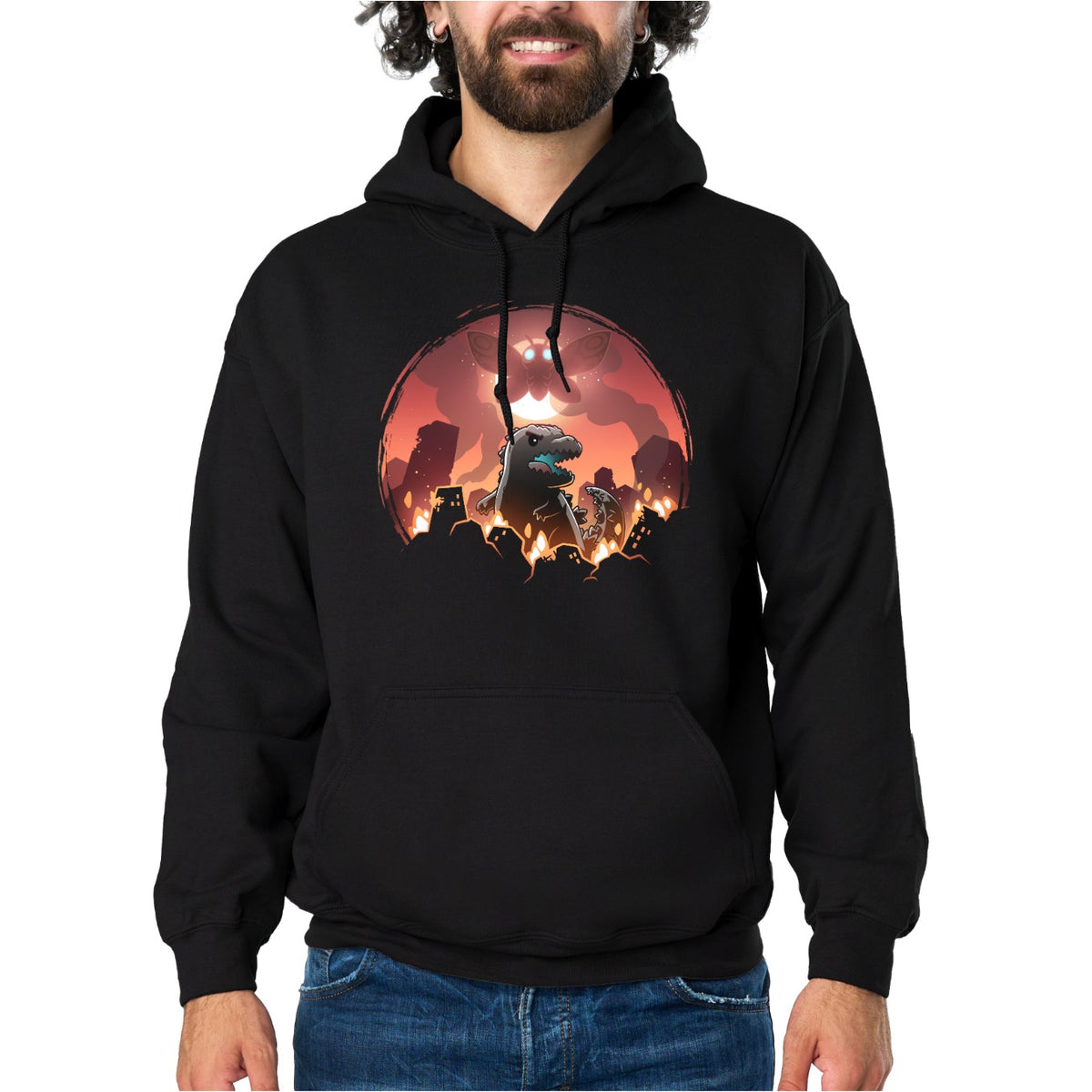Pullover Hoodie_TeeTurtle black Godzilla and Mothra Rampage apparel featuring Godzilla rampaging around a burning city with Mothra floating in the sky in front of a full moon.