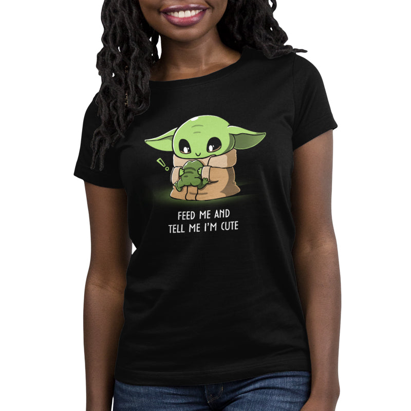 The Feed Me and Tell Me I'm Cute t-shirt features Grogu, also known as baby Yoda.