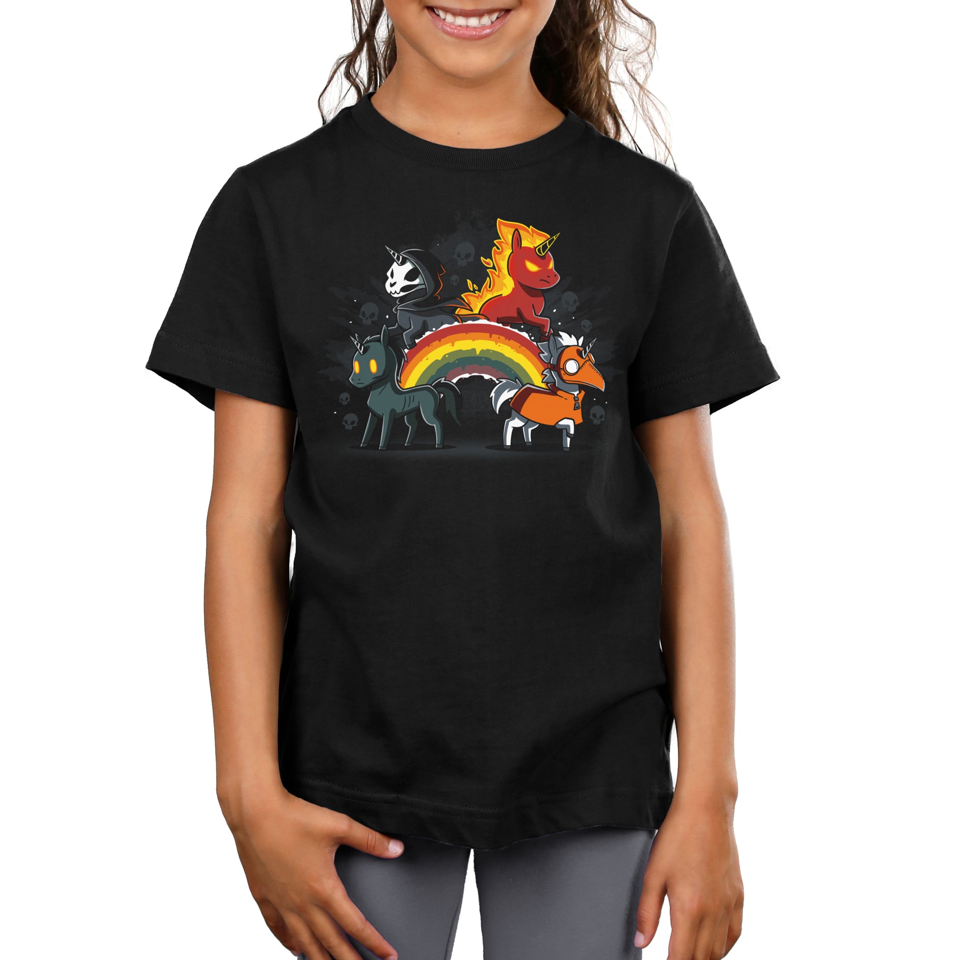A girl wearing a "Four Unicorns of the Apocalypse pt 2" t-shirt by TeeTurtle with an image of a unicorn.