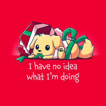 Classic Cotton T-shirt_TeeTurtle red Presently Confused apparel featuring a dog tangled up in wrapping paper and ribbon, with the caption, “I Have No Idea What I’m Doing”.