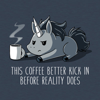 Premium Cotton T-shirt_Teeturtle denim blue Before Reality Kicks In apparel featuring a grumpy-looking unicorn on its stomach with a cup of steaming coffee in front of it. Caption reads 'This coffee better kick in before reality does".